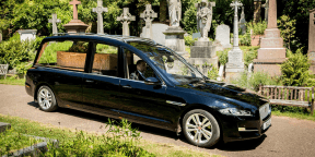 Hearse & Chauffeur In Cemetery